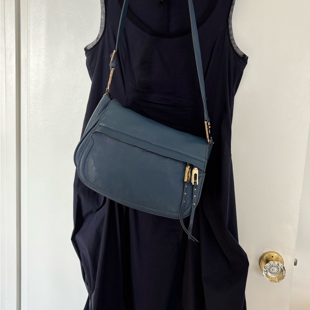 Stylish Black Dress with Blue Crossbody Bag